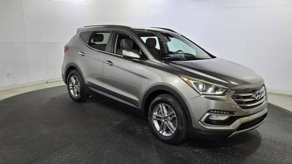 HYUNDAI SANTA FE SPORT 2018 5NMZUDLB0JH064766 image